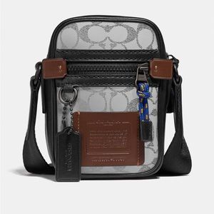 Coach Dylan 10 reflective cross body bag